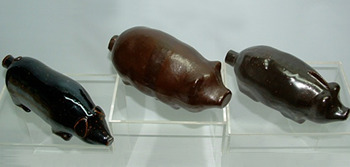 Click photo to see larger pic of Collectible Figural Pig Bottles